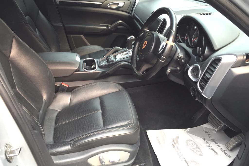 Porsche Cayenne S door view of front seats