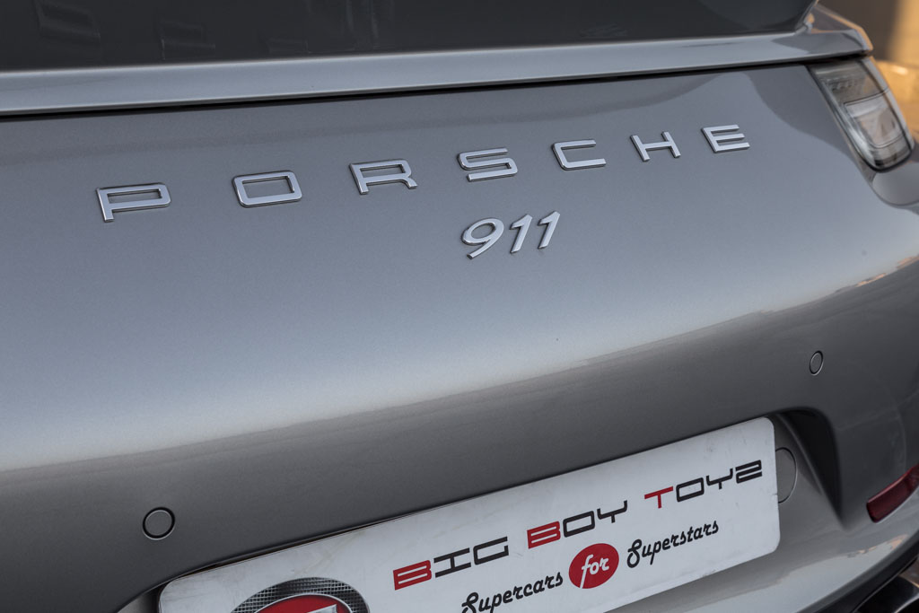 Porsche 911 Carrera S model and badging