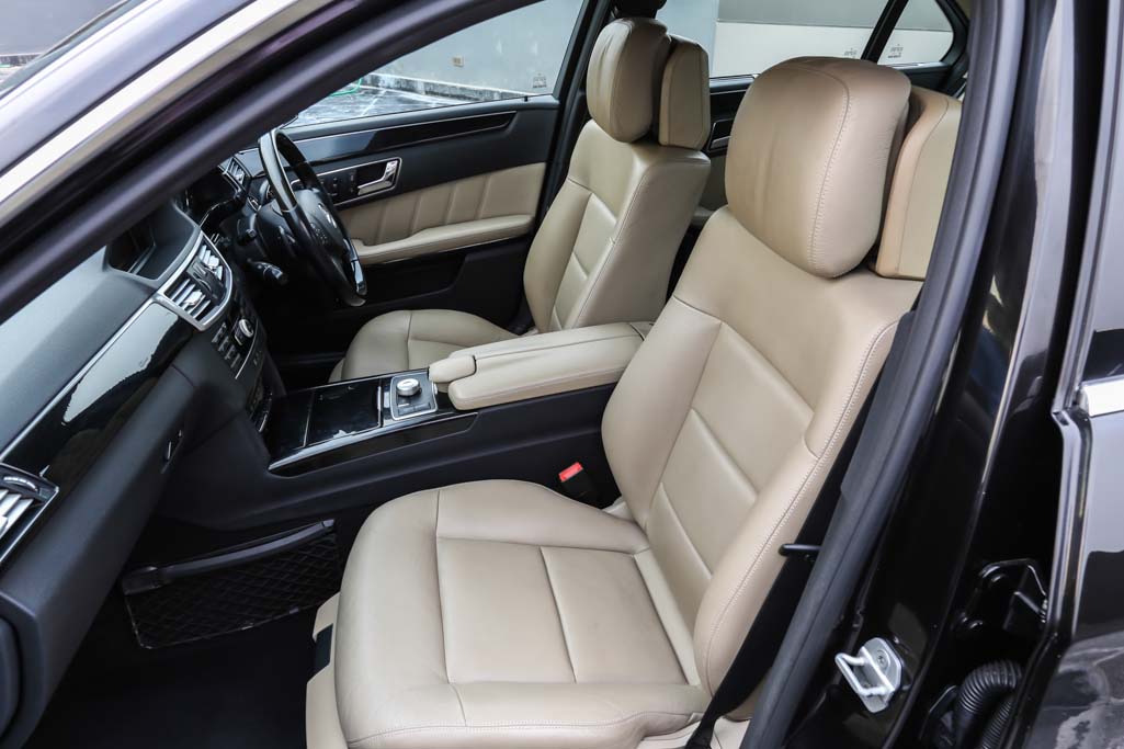 Mercedes Benz E350 CDI door view of front seats